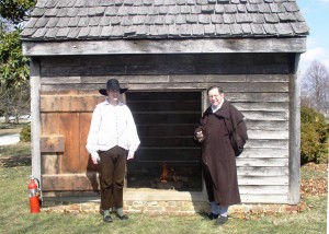 Historic-site interpreters outside the John Dickinson Plantation’s smokehouse. Preserving meat through smoking will be demonstrated at the “18th Century Trades Day” on Oct. 14, 2017.