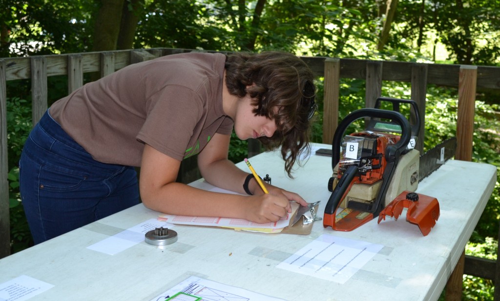 Middletown HS FFA student Erin Fogarty completes the equipment portion of the forestry challenge held at Camden's Brecknock Park.