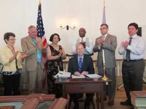 The Governor was joined by members of the General Assembly and others to sign eight bills to improve Delaware’s election laws and aid the the Public Integrity Commission.