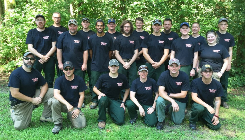 Delaware wildfire crew at Blackbird State Forest: Front Row: (from left) Todd W. Shaffer of Smithsburg, MD; Samual L. Topper of Federalsburg, MD; Christopher S. Riale of New Castle; Monica Testa of Newark; Adam N. Keever of Newark; Alexander J. Jenks of Rehoboth Beach. Back Row: (from left) William T. Seybold of Dover; Charles D. Collins of Newark; Todd D. Gsell of Townsend; Nathaniel J. Sommers of Smyrna; Daryl D. Trotman of Milford; Scott A. Veasey of Millsboro; Zachary R. Brown of Harbeson; Spencer F. Valenti of Dover; Bartholomew D. Wilson of Dover; Jeffrey A. Wilson of Clayton; Daniel A. Mihok of Camden; Michael L. Krumrine of Magnolia; Laura K. Yowell of Trappe, MD; and, Christopher R. Valenti of Dover.