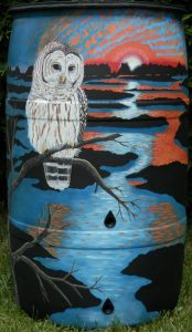 Photo of winning painted rain barrel