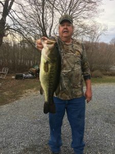 Thomas Passwaters Sr. with one of his state-record catches, a 6-pound, 7-ounce largemouth bass.