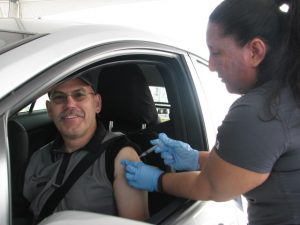 Michael Whitt of Dover getting his flu shot from Bayhealth Pharmacist Evelyn Eckenrode, RPH