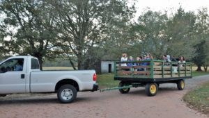 Visitors enjoying a wagon-ride guided tour of the John Dickinson Plantation grounds. Wagon rides will be part of the “Lantern Tours of the Plantation” on Oct. 27, 2017.