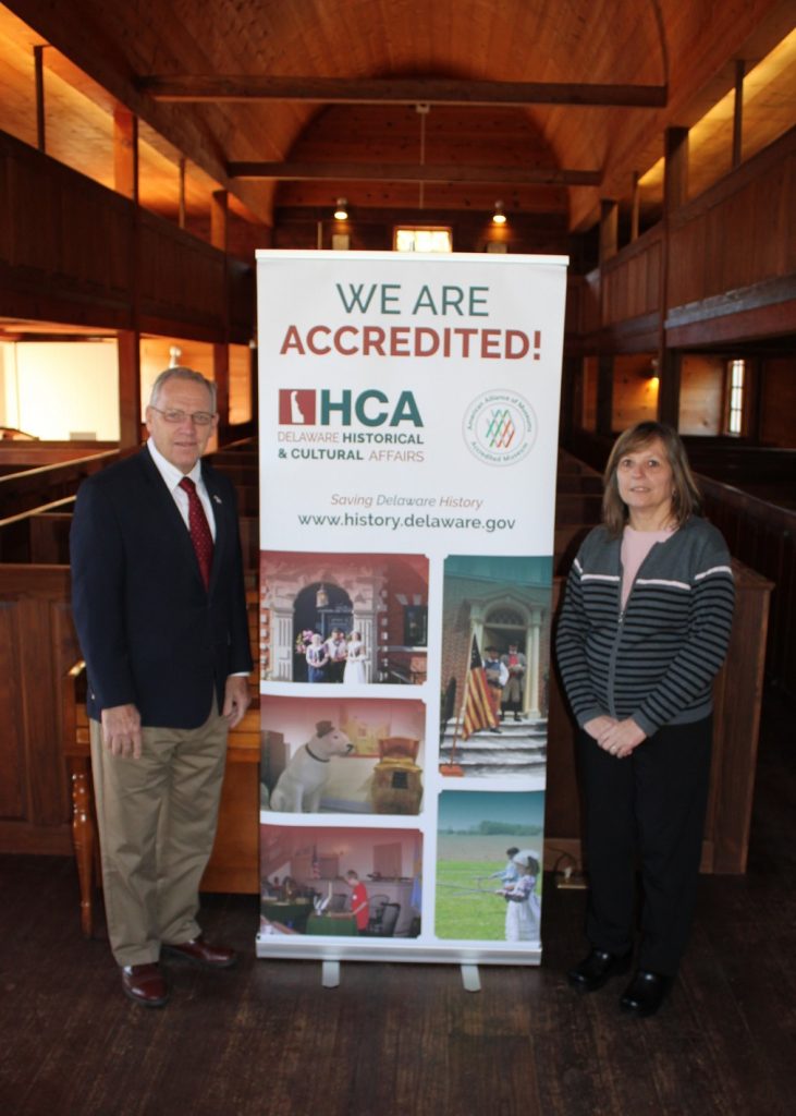 State Rep. Richard G. Collins visits Prince George’s Chapel in celebration of the Division of Historical and Cultural Affairs’ accreditation by the American Alliance of Museums. With Collins is Crystal Hudson of the Friends of Prince George’s Chapel.