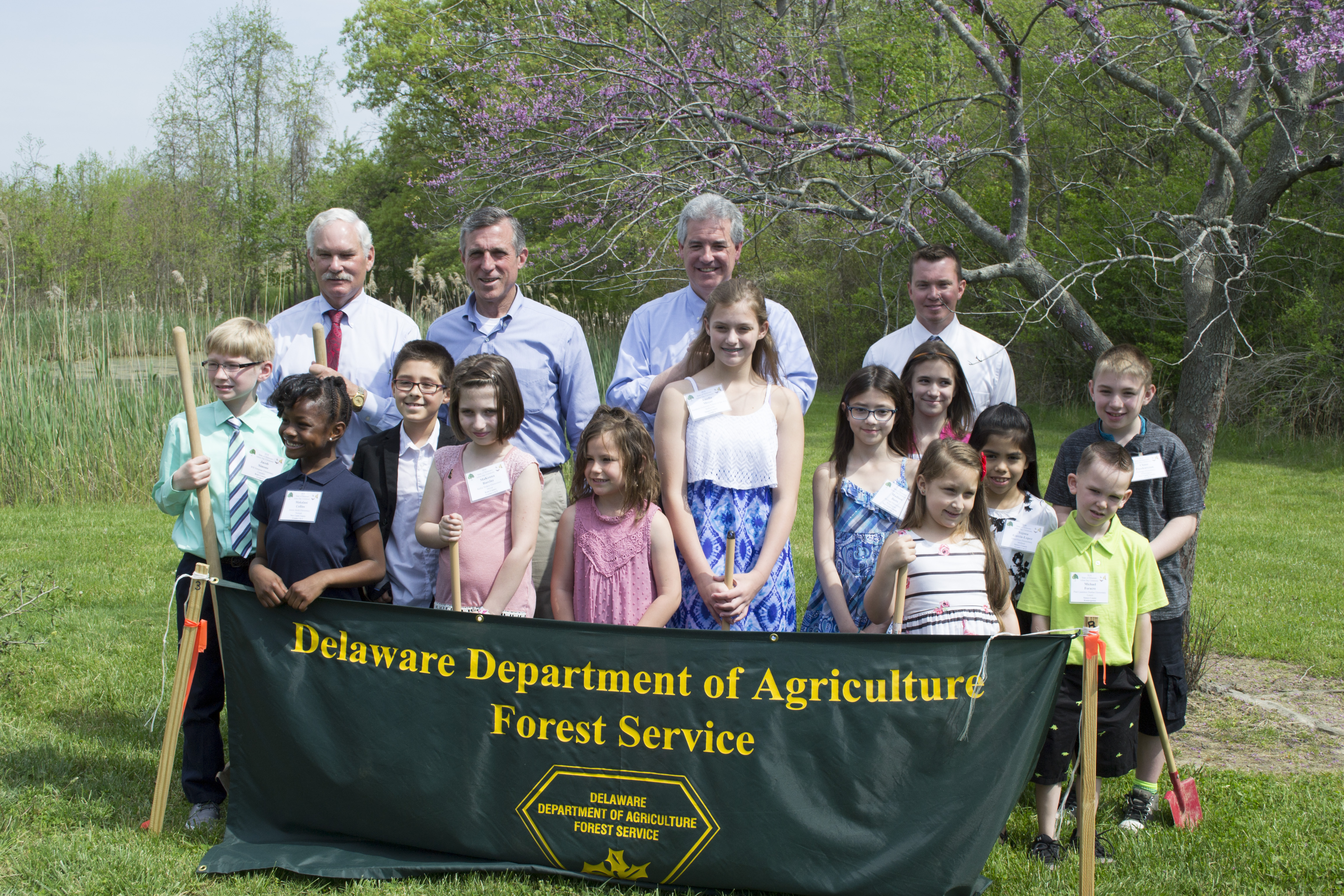 Gov. Carney, state officials and students at Delaware Arbor Day at St. Jones Reserve in Dover.