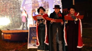 Carolers and blow up snow globe