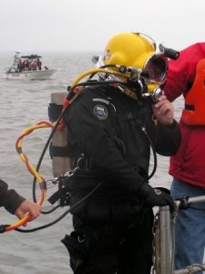 Photo of a diver returning from an archaeological investigation of the Roosevelt Inlet Shipwreck site in Delaware Bay on Oct. 11, 2006.