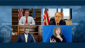 Governor Carney, Secretary of Finance Rick Geisenberger, Office of Management and Budget Director Cerron Cade, and an ASL Interpreter appear on a virtual briefing for the Governor's FY 23 budget briefing.