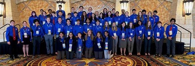 Three rows of Delaware students accept awards at national STEM conference
