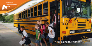 Students getting off of a school bus