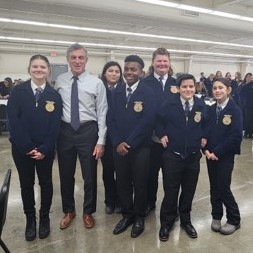 A group of FFA students pose for a picture with Governor Carney.