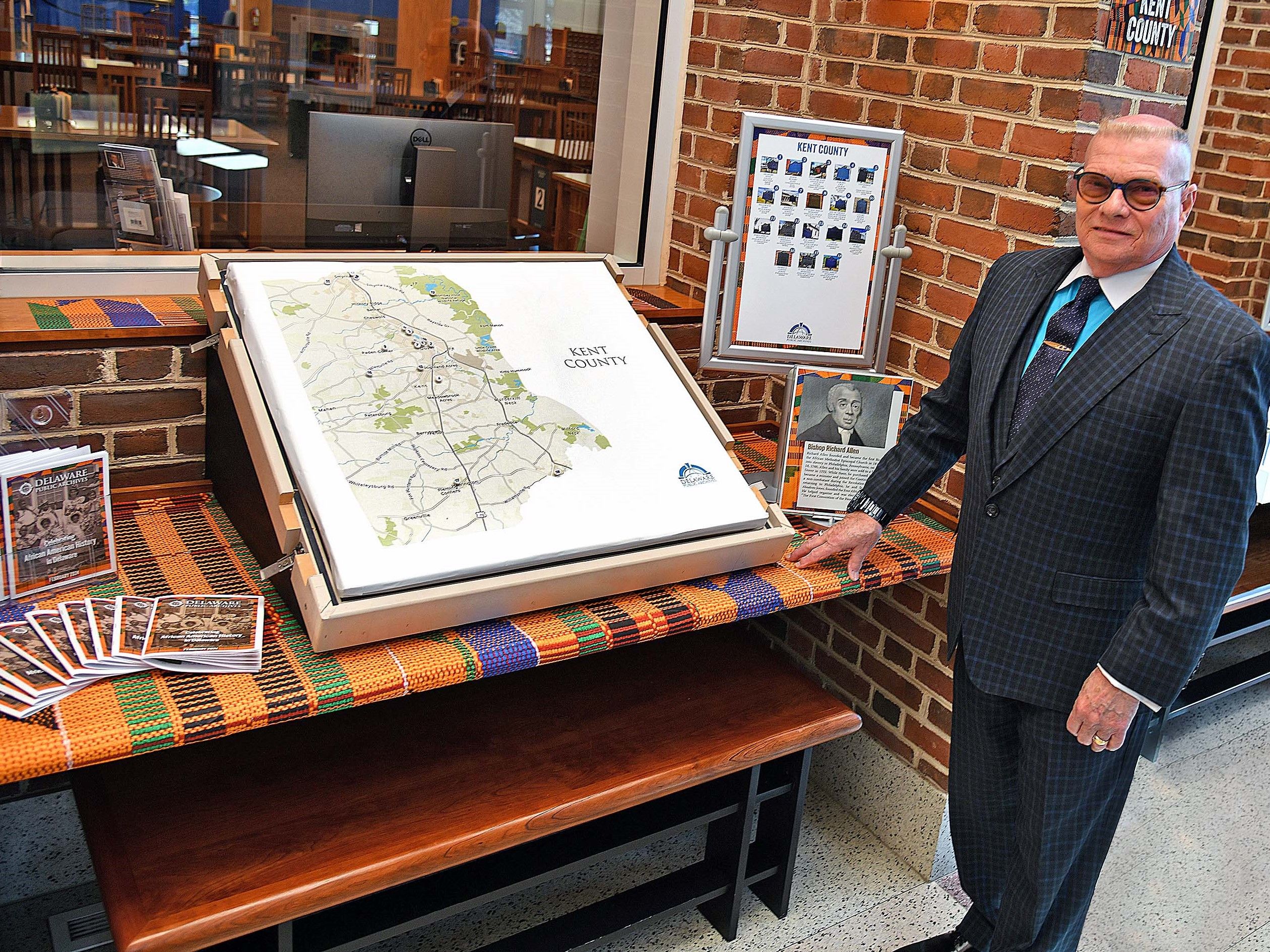 Photo of Delaware Archivist Steve Marz and the 2024 African American Historical Markers Exhibit