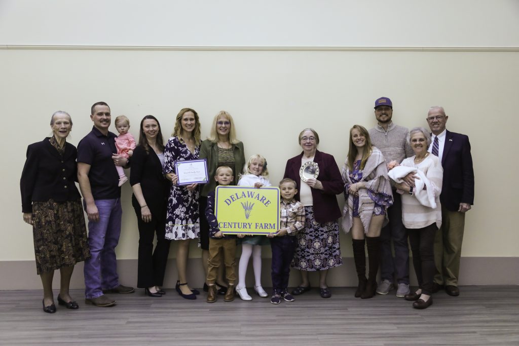 Picture (L to R): Evelyn Shahan, Blake, Natalie, and Stephanie Warnick, Ashley Warnick Heuchling, Valerie Warnick, Logan, Ava, and Zane, Mary Kathryn Warnick, Samantha, Wade, and Kylie Warnick, and Jean Warnick Kenton and Harvey Kenton were present to support Valerie in receiving the Delaware Century Farm Award.