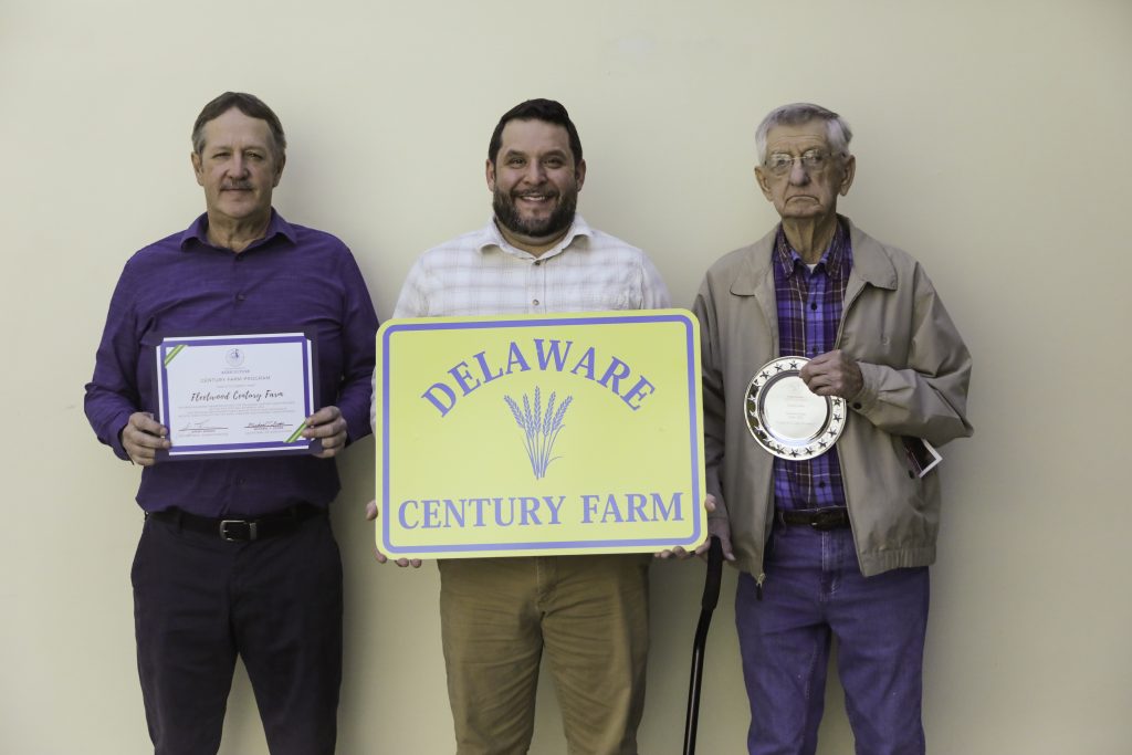 Picture (L to R): Todd Fleetwood, son; R.T. Fleetwood, grandson; and Roland Fleetwood accepted the Century Farm Award.