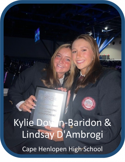 Kylie Doyon-Baridon and Lindsay D’Ambrogi from Cape Henlopen High School smile for the camera while holding a HOSA award.