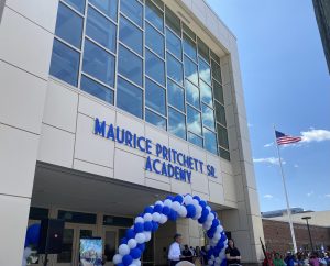 Governor Carney speaks at a podium to celebrate the opening of the Maurice Pritchett Sr. Academy