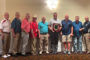 Dr. Mark Isaacs received the Secretary's Award for Distinguished Service to Delaware Agriculture during the State Fair Awards Presentation from Secretary of Agriculture Michael T. Scuse. Pictured L to R: Former Representative and State Fair Director Harvey Kenton, Representative Charles Postles, Representative Tim Dukes, Senator Dave Wilson, Senator Gerald Hocker, Dr. Mark Isaacs, Representative Peter Schwartzkopf, Former Senator Gary Simpson, Secretary of Agriculture Michael T. Scuse