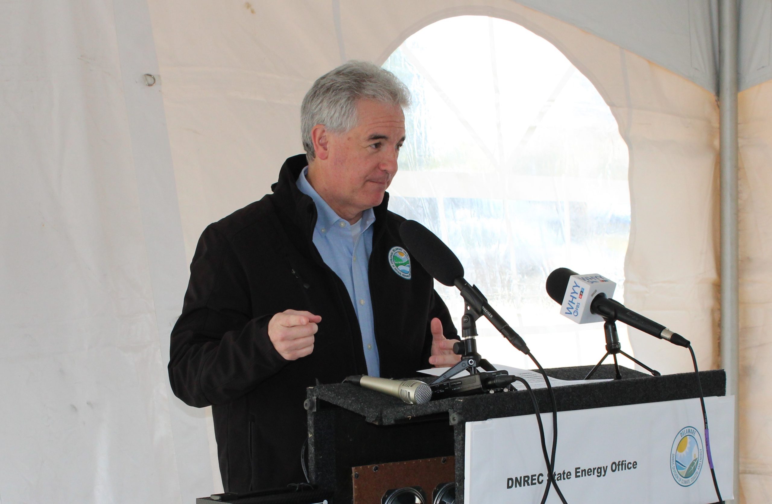 DNREC Secretary Shawn Garvin stands behind a podium