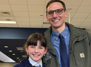 Deputy Secretary Brosch and his niece in FFA jacket at FFA event