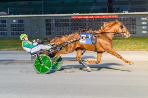 Swee'pea, driven by Corey Callahan, won in 2:00.3 Tuesday at Bally's Dover.