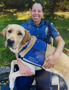 Senior Corporal DiClemente and Vinn the facility dog