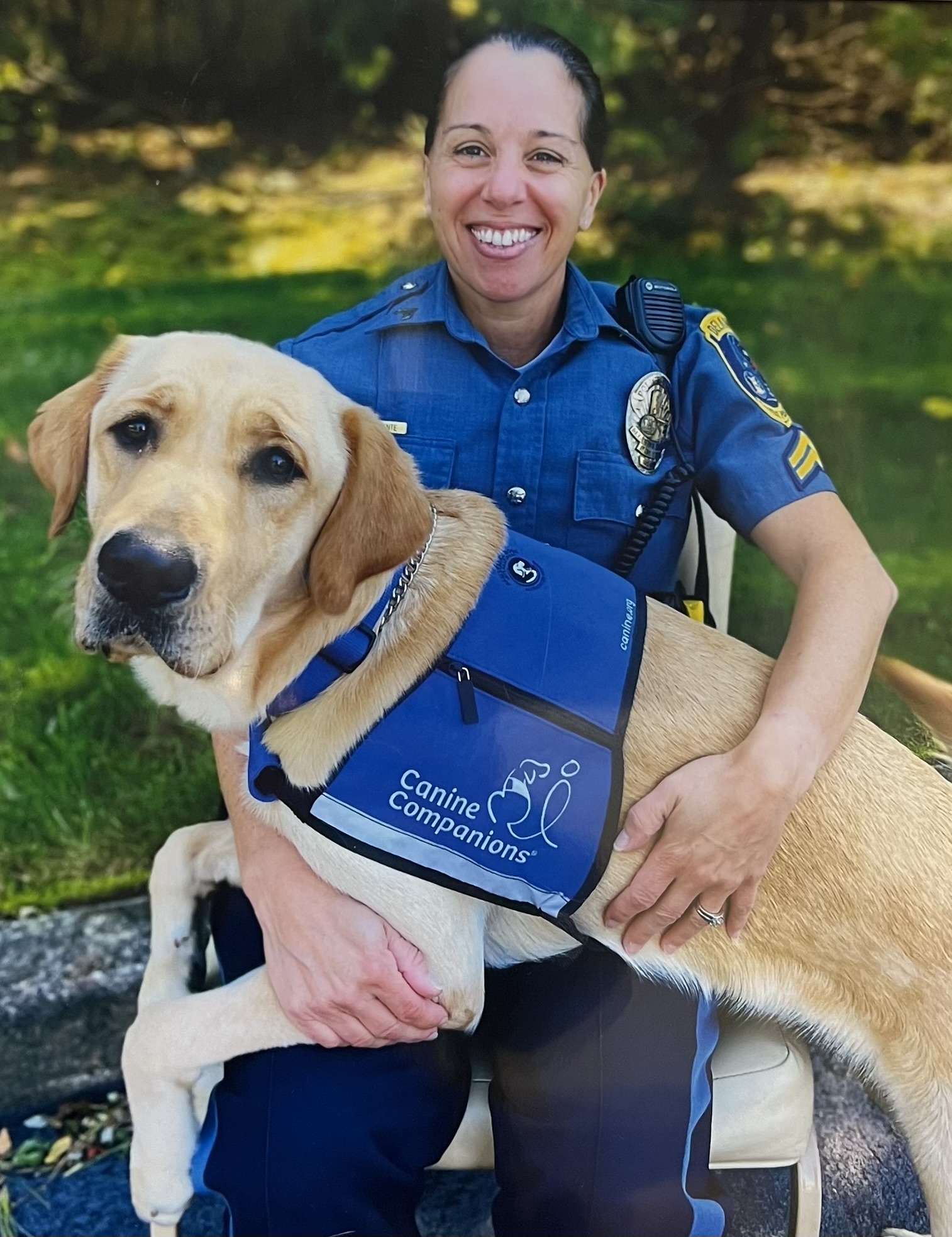 Senior Corporal DiClemente and Vinn the facility dog