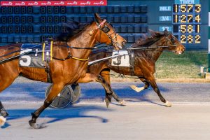 Legend of Rock, driven by Corey Callahan, won by a neck on Tuesday at Bally's Dover.