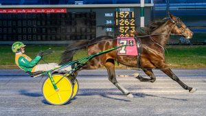 Melvin G, driven by Tim Tetrick, earned a 1:57.2 win Tuesday at Bally's Dover.