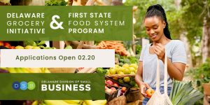 background of a farmers market with a black woman shopping for vegetables to the left of her.