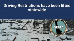 Driving restrictions have been lifted statewide overlayed winter scene with dema logo