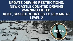 Update Driving Restrictions: Driver Warning lifted for New Castle County. Driving Restrictions for Kent, Sussex Counties to remain at Level 2. Overlaying winter scene with DEMA Logo.