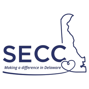 SECC logo featuring an outline of the state of Delaware with a heart at the base and the text "SECC - Making a difference in Delaware."