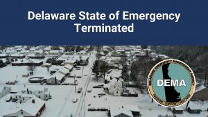 Delaware State of Emergency Terminated overlayed on winter scene with DEMA logo