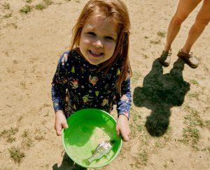 A Delaware Youth Fishing contestant proudly shows off her catch at an earlier tournament. /Delaware DNREC photo