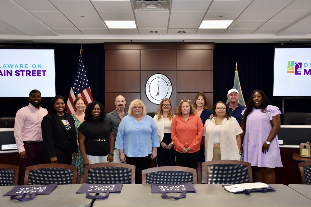 A group photo of Main Street Program members at Town Hall in Middletown.